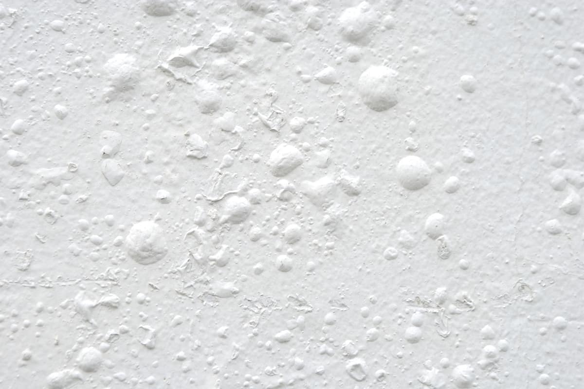 Bubbling paint in the ceiling due to hot interior weather