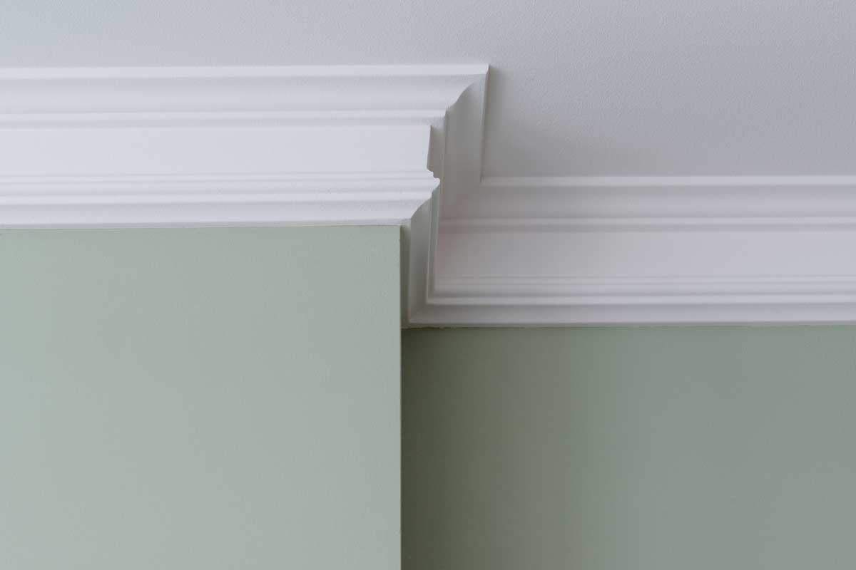 Ceiling moldings in the interior, a detail of intricate corner.