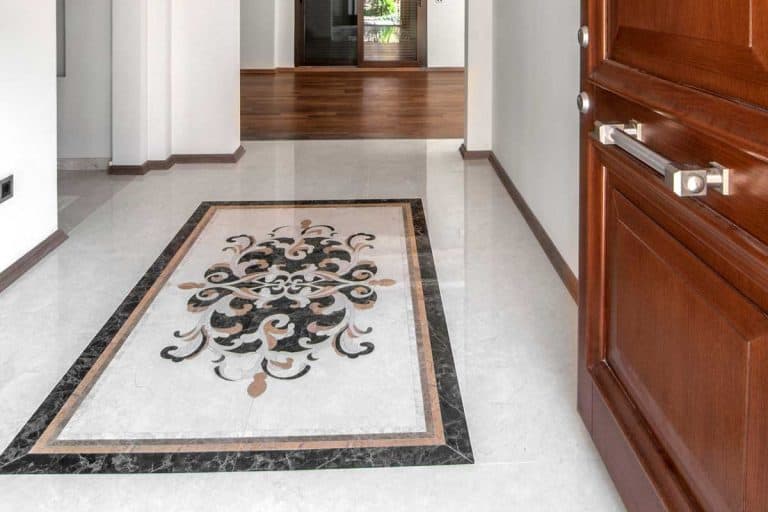 A luxurious home entryway with tile flooring, How to Tile Entryway Floor [7 Easy Steps]