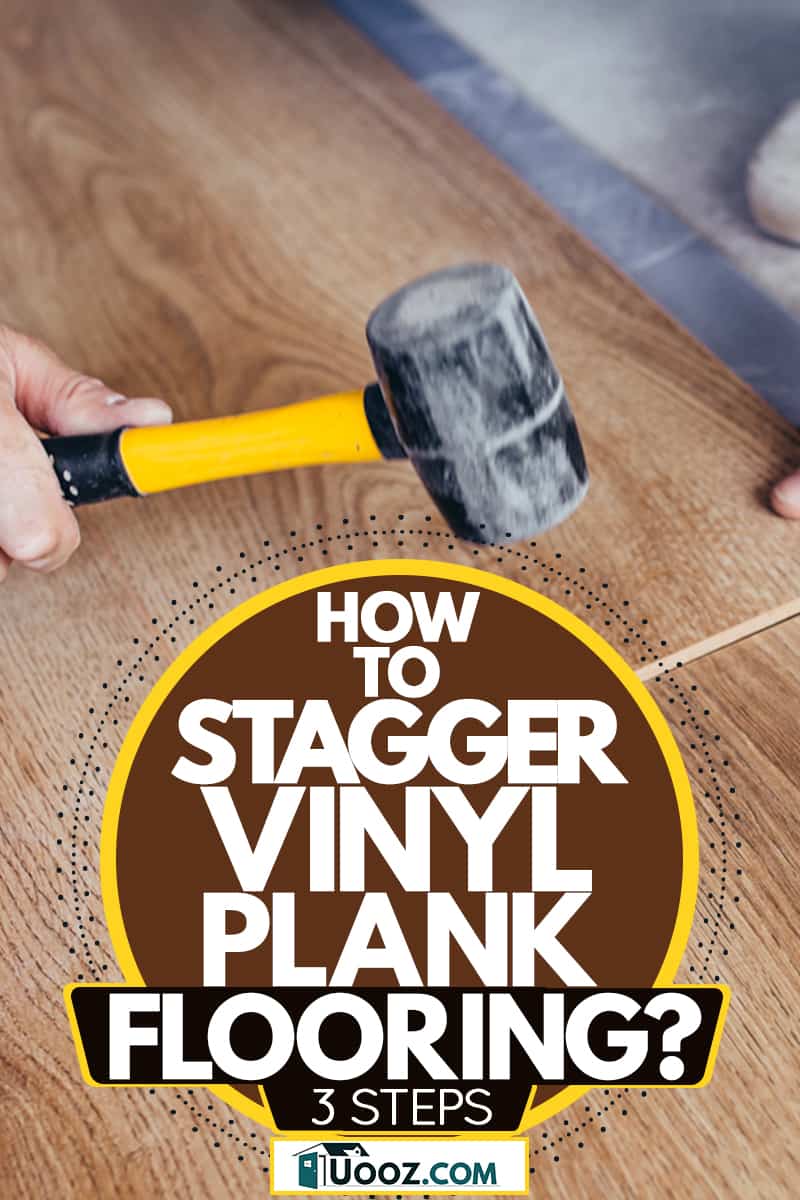 A tile setter using a small mallet to place a vinyl plank flooring, How to Stagger Vinyl Plank Flooring? [3 Steps]
