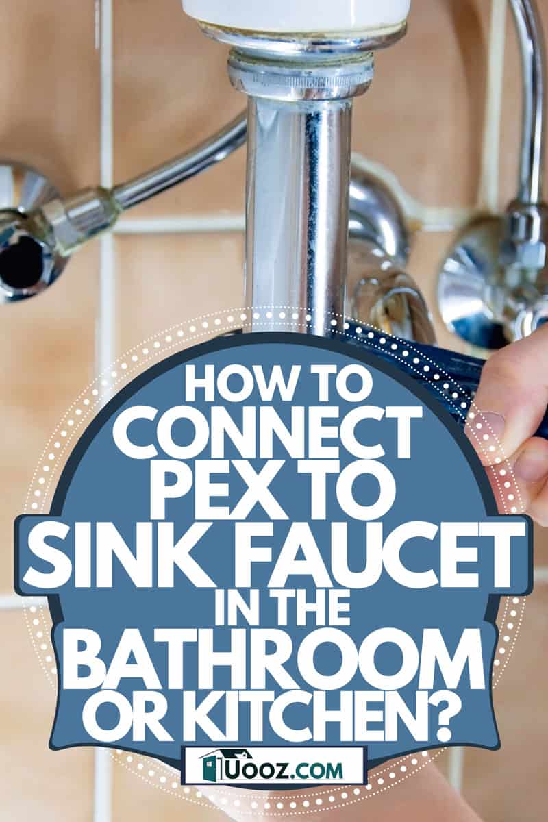 A plumber using a pipe wrench to tighten the plumbing line to a bathroom sink, How To Connect PEX To Sink Faucet In The Bathroom Or Kitchen?