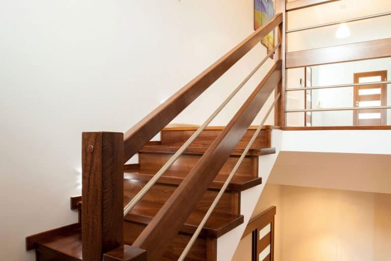A wooden staircase of a rustic themed farmhouse, How Many Stairs are in a Standard Staircase?