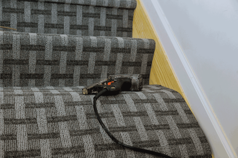 installing carpet on staircase using gas operated tack. How To Install Carpet On Stairs Without A Kicker