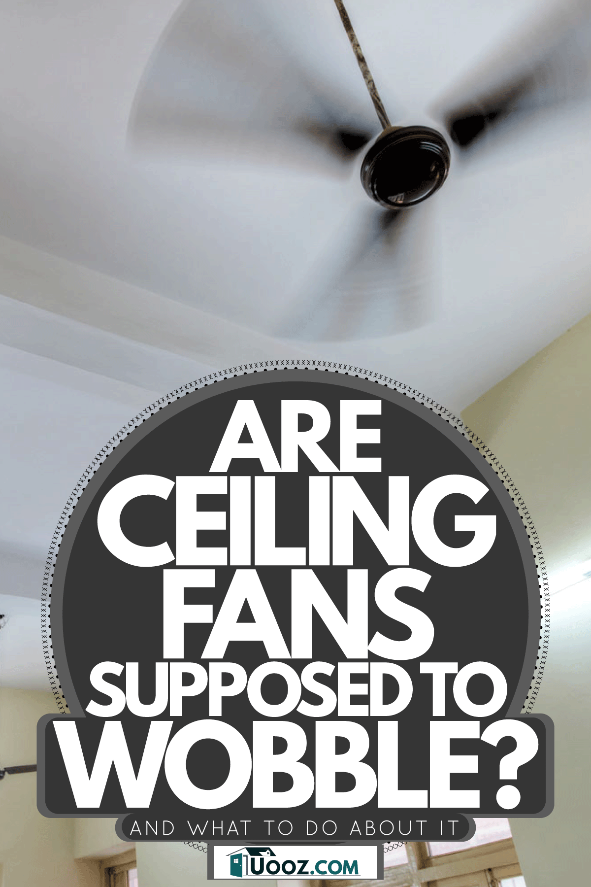 A huge and spacious room with dozens of black ceiling fans, Are Ceiling Fans Supposed To Wobble? [And What To Do About It]