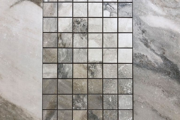 A gorgeous gray themed backsplash inside a bathroom, Can You Use Floor Grout On Walls?