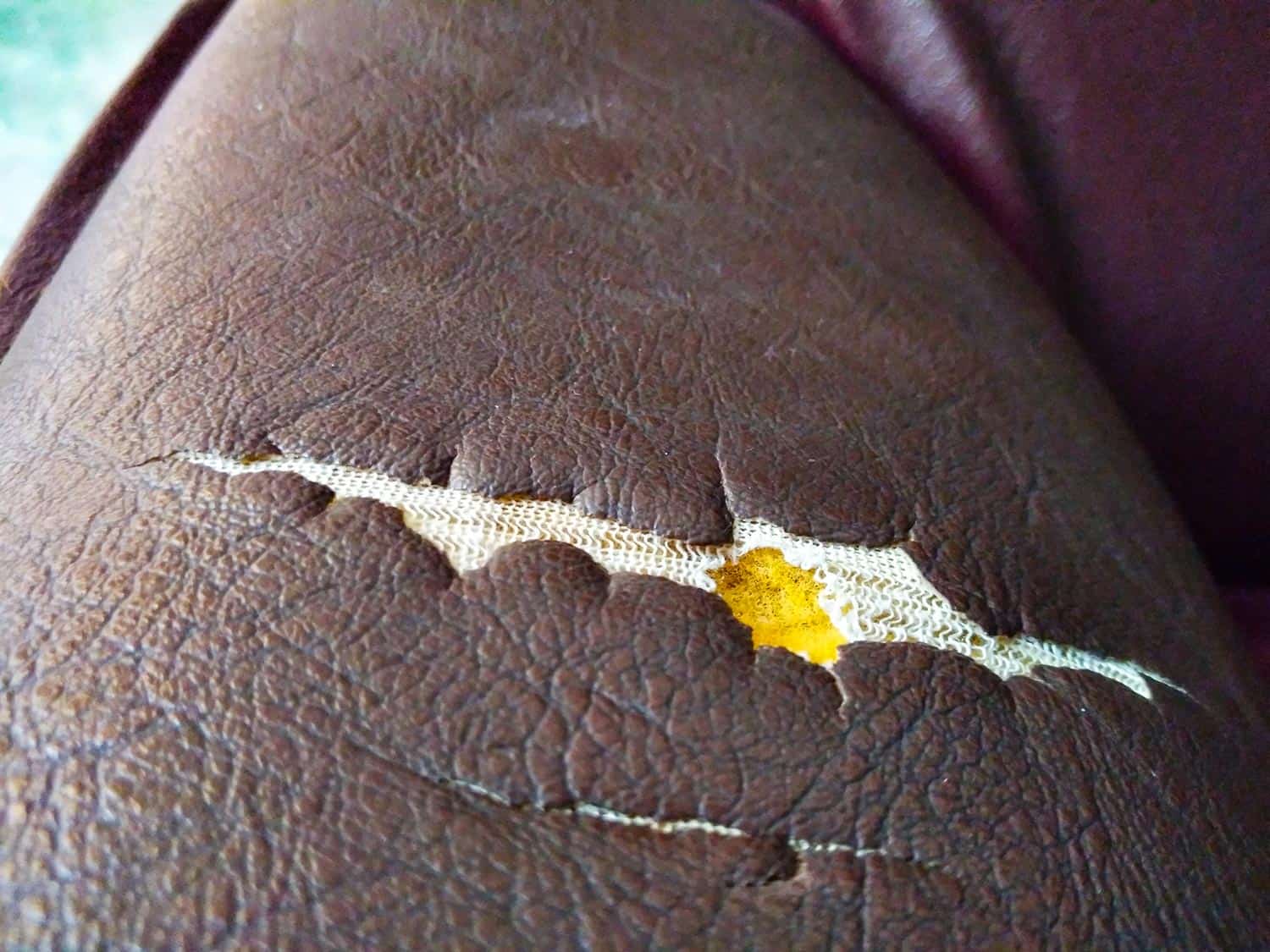 Crack spot on the arm-rest of an arm chair or sofa