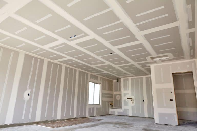 Construction building industry drywall taping compound finishing, Does Drywall Go All The Way To The Floor?