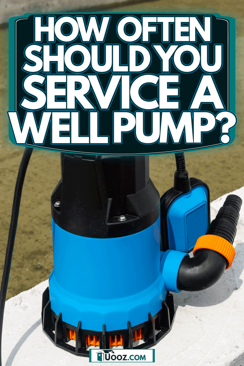 A blue colored well pump placed on the side of the concrete, How Often Should You Service A Well Pump?
