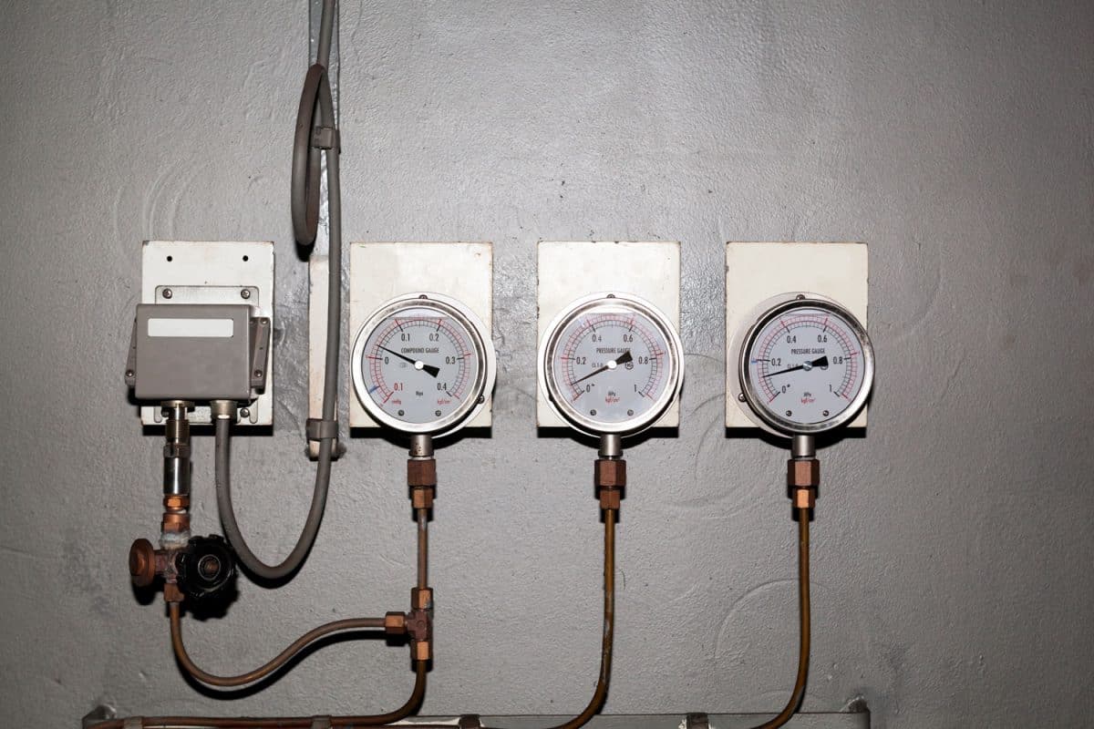 Industrial pressure gauge meters installed on the wall