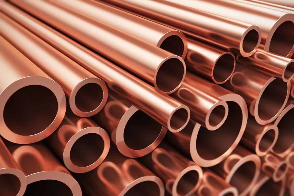 Shinny copper pipes with different sizes stockpiles