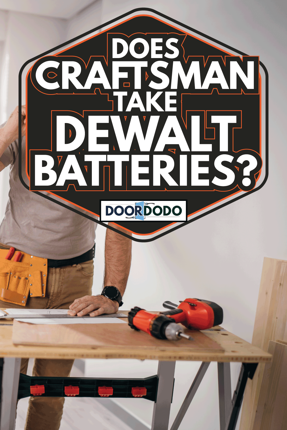 male carpenter talking on the phone with a customer, cordless power drill beside him. Does Craftsman Take DeWalt Batteries