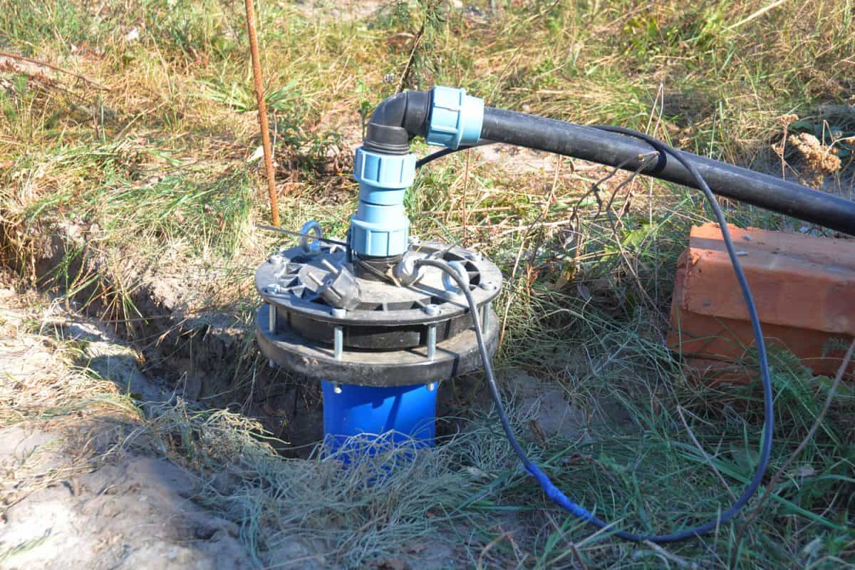 A blue colored bore hole well pump