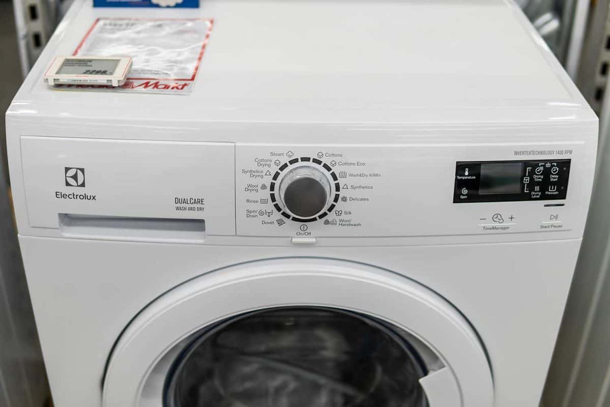 A free-standing Electrolux dryer washing machine