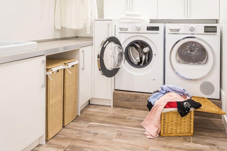A washing machine and dryer on the side in the laundry room, GE Dryer Won't Start—What To Do?