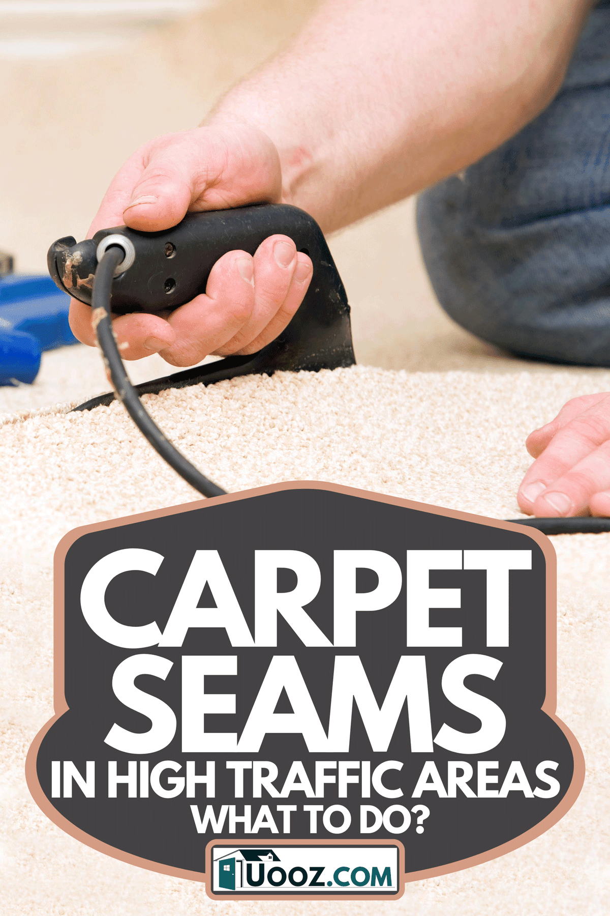 A carpet Installer joining two pieces with seam iron, Carpet Seams In High Traffic Areas - What To Do?
