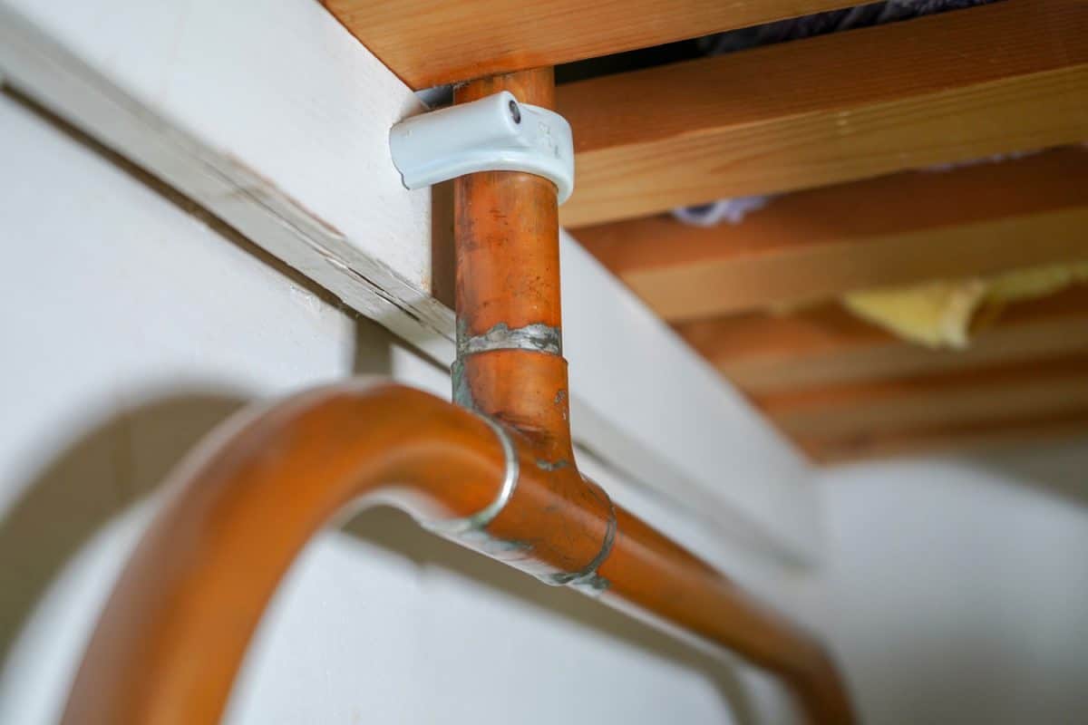Copper pipe fixtures directed to the water line of the house