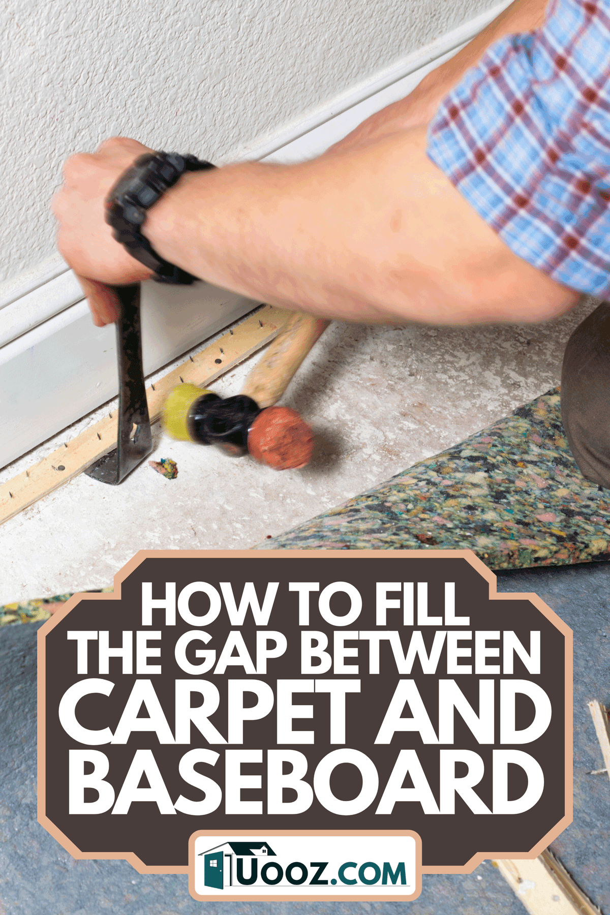 Worker removing old carpet in an American home, How To Fill The Gap Between Carpet And Baseboard