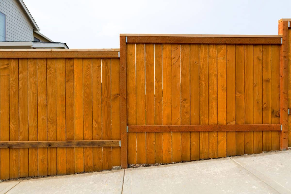 Pressure treated wood used in building a fence