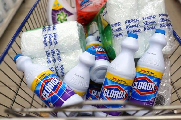 Shopper stock up bottles of Clorox Bleach and other toiletries products on shopping cart in a supermarket, Can You Use Clorox On Your Carpet?