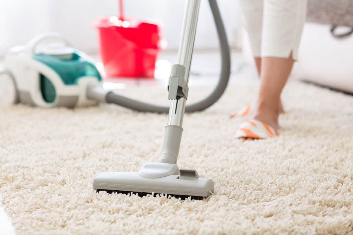 Using a vacuum cleaner in cleaner a dirty carpet