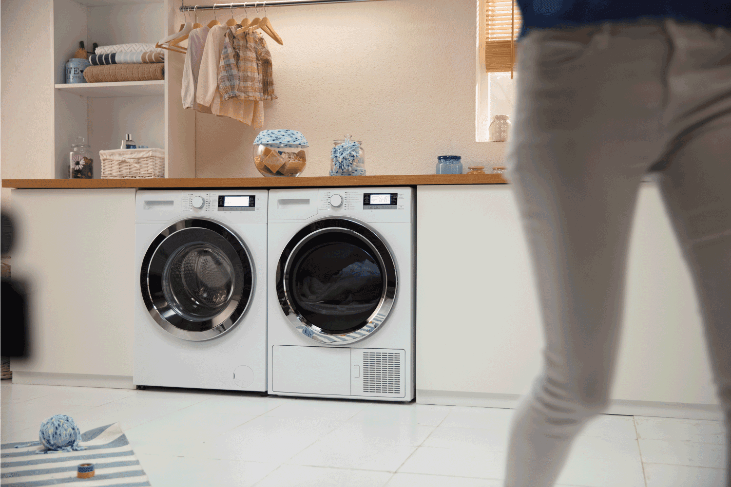 Woman in modern laundry room