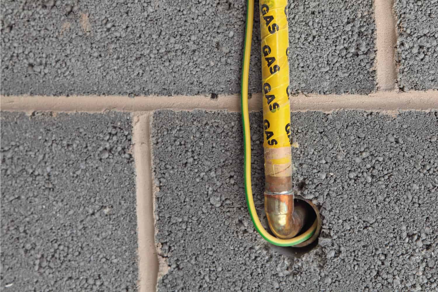 A new central heating gas pipe with earth cable