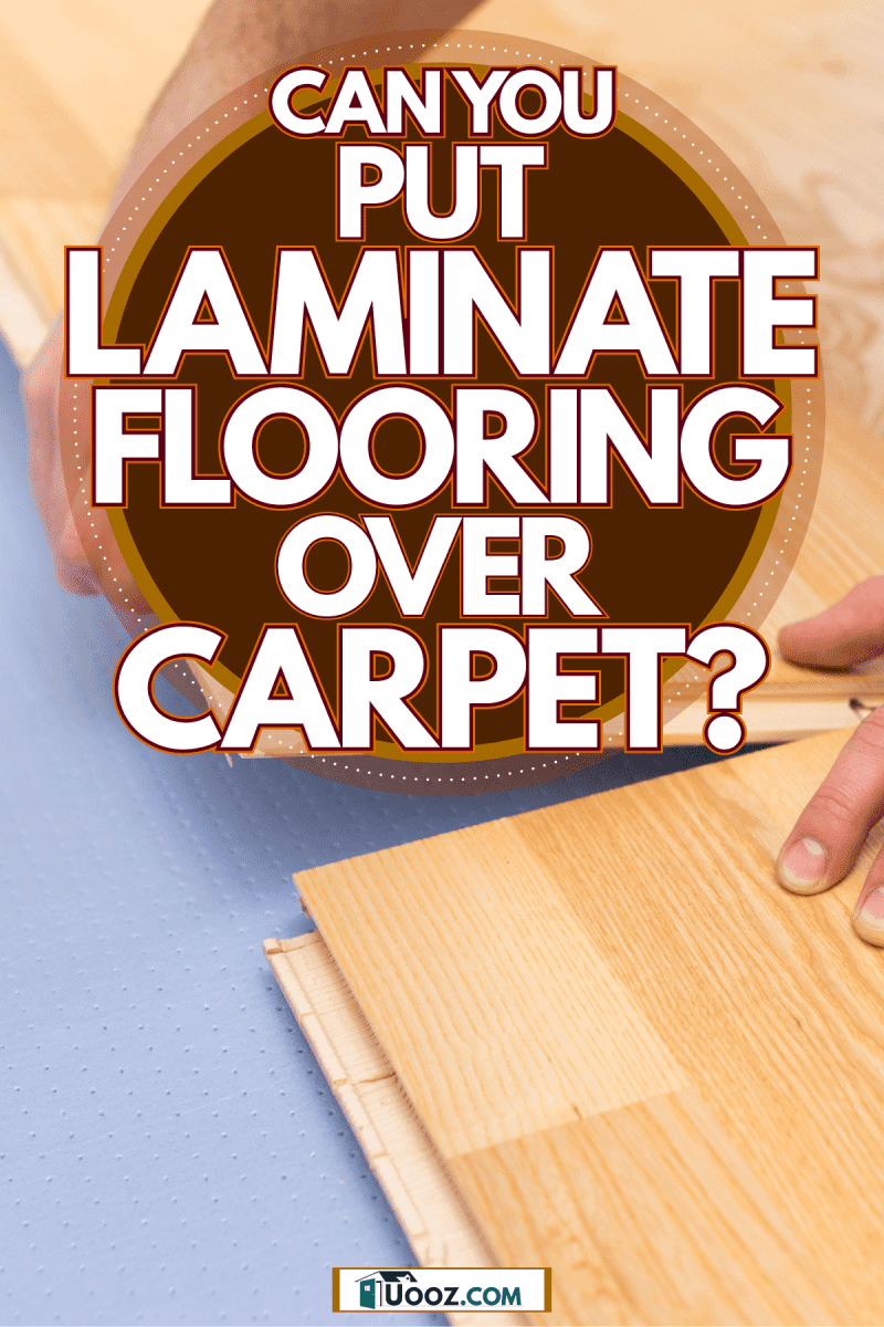 A tile setter placing a laminated flooring on the living room floor, Can You Put Laminate Flooring Over Carpet?