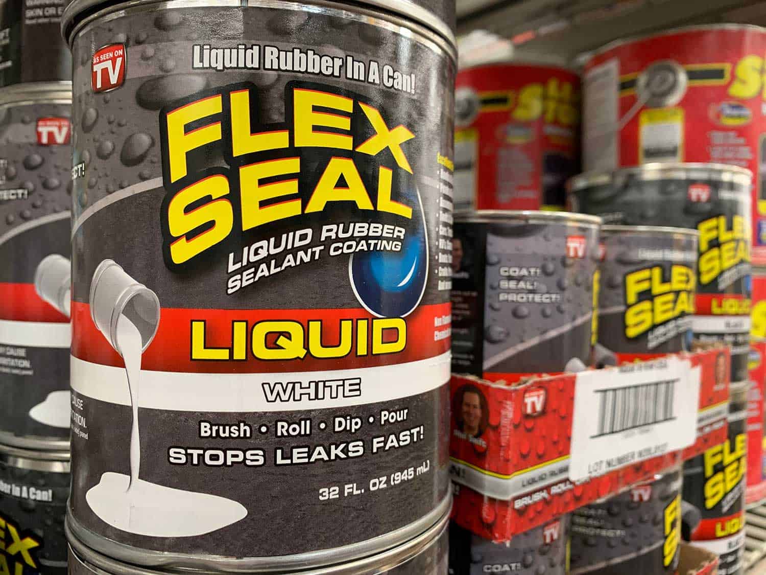 Cans of Flex Seal on a store shelf