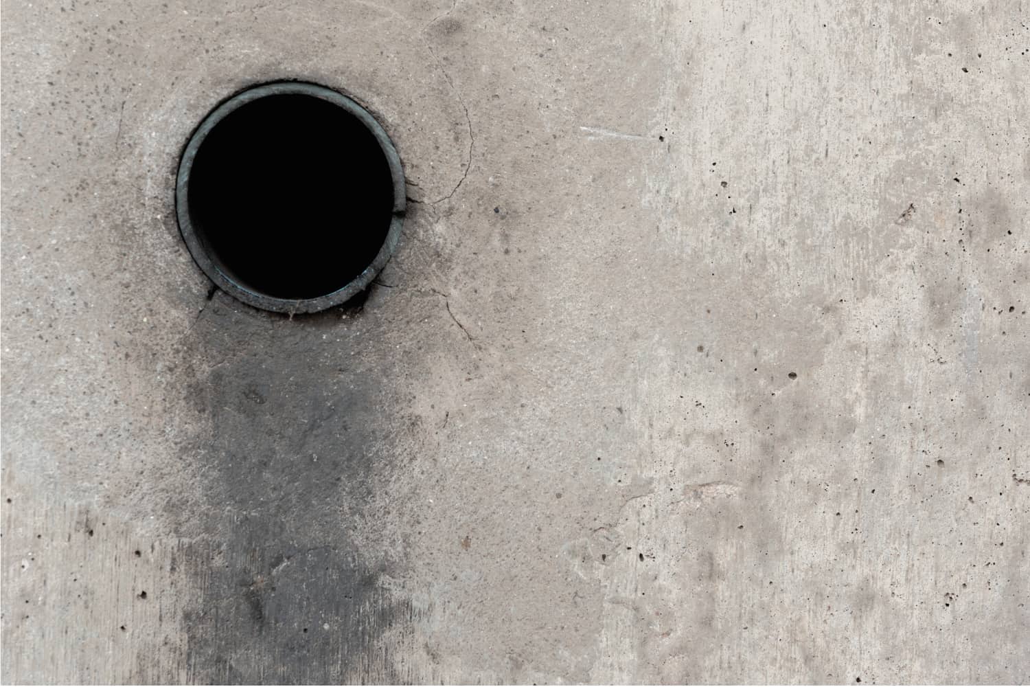 Old Cement wall background with pipe hole