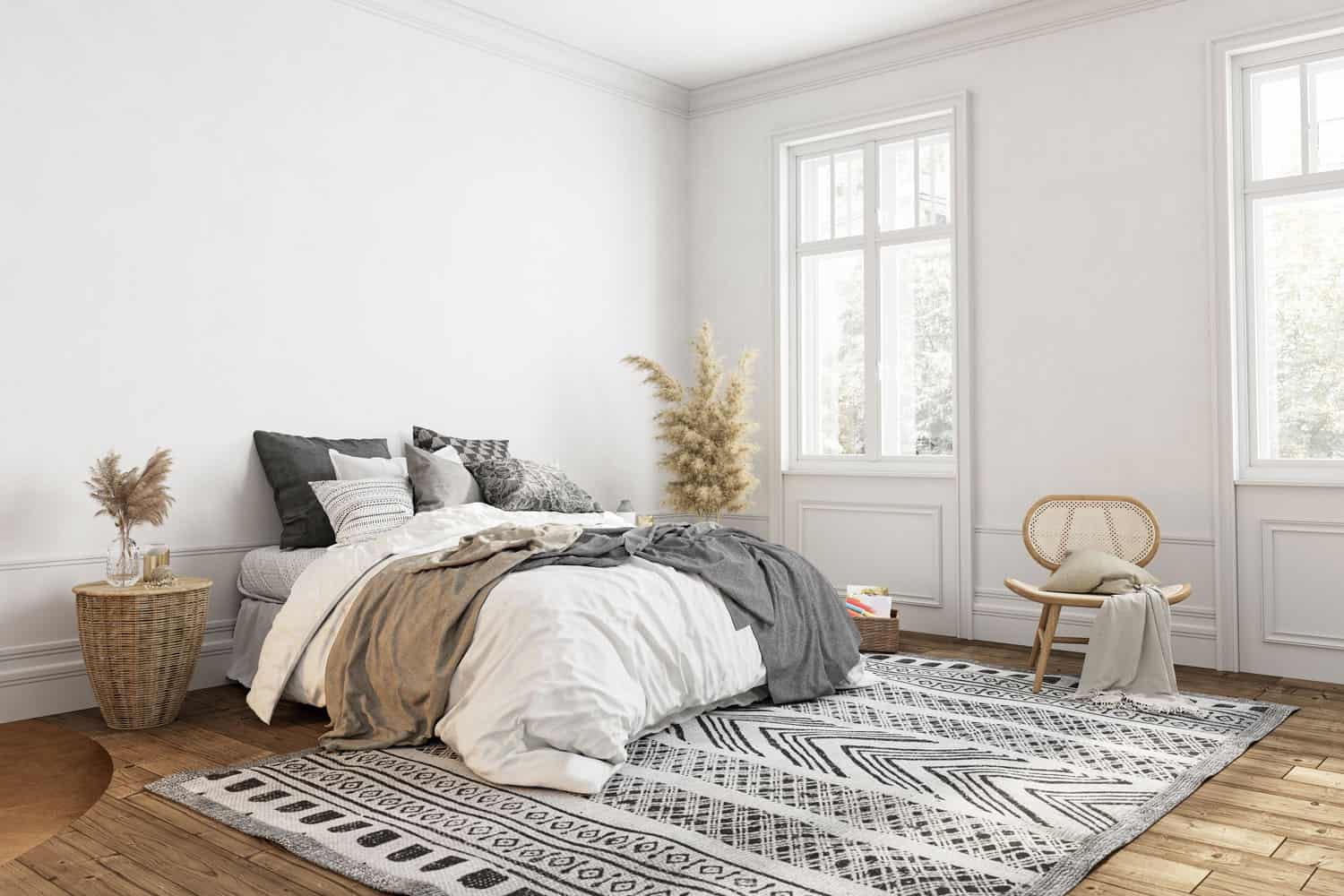 A bohemian themed bedroom with white walls, wooden flooring and throws on the bed