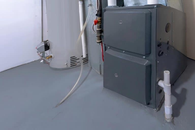 A high energy efficient furnace in a basement, Where's The Lennox Furnace Reset Button? [And How To Use It]