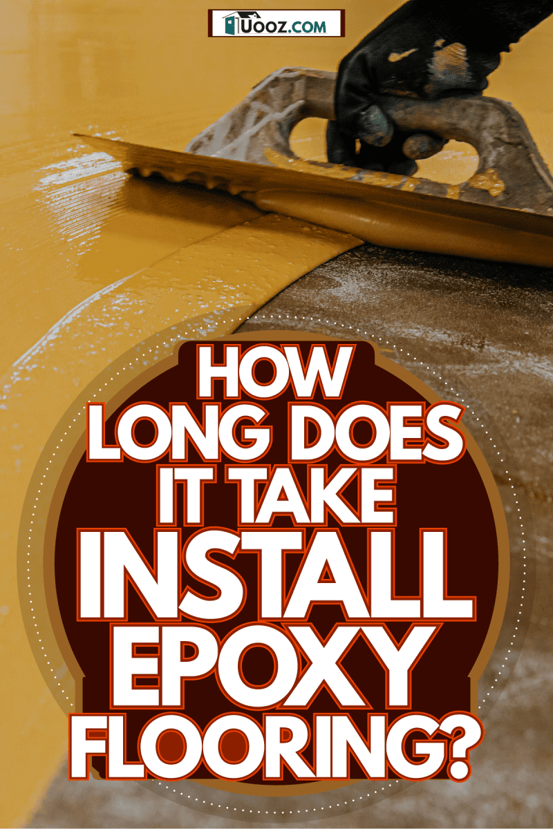Spreading yellow epoxy on the building floor, How Long Does It Take To Install Epoxy Flooring? 