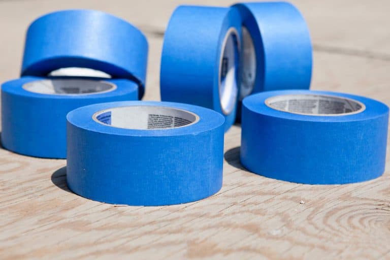 Roll of blue painters tapes over plywood, Can You Use Painters Tape On Carpet?
