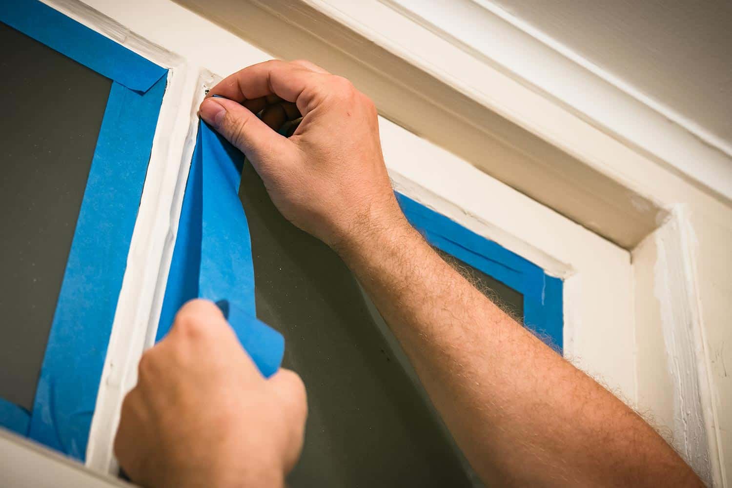 Taping off glass with blue painter's tape