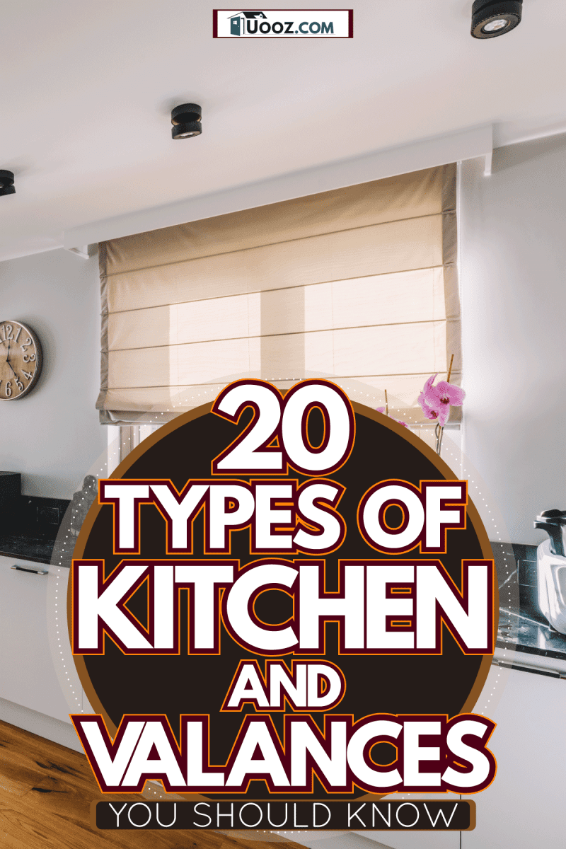 Interior of a bright open space condominium unit with wooden flooring, white cabinets and matching brown curtains, 20 Types of Kitchen Curtains and Valences You Should Know