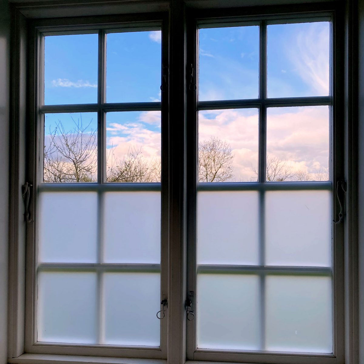 A semi frosted kitchen glass window