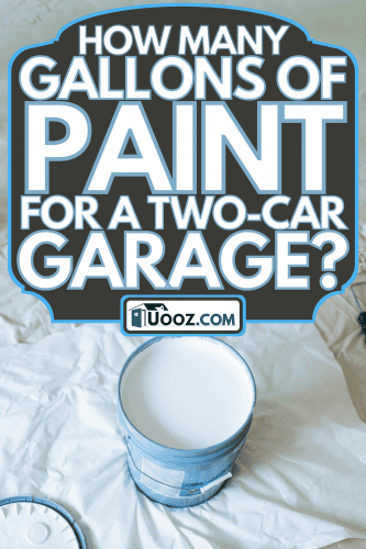Five gallon paint bucket and a roller brush on the floor, How Many Gallons Of Paint For A Two-Car Garage?