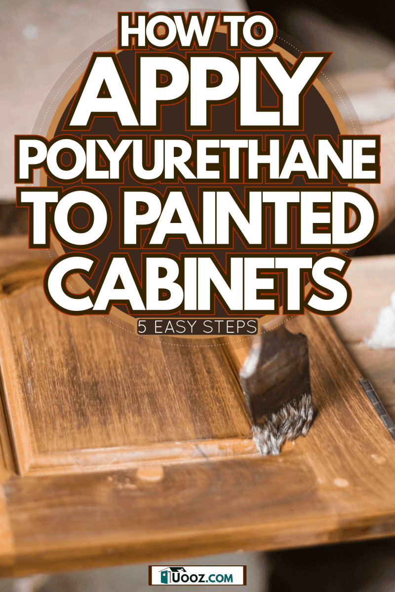 Worker applying polyurethane coating on the small cabinet panel, How To Apply Polyurethane To Painted Cabinets [5 Easy Steps]