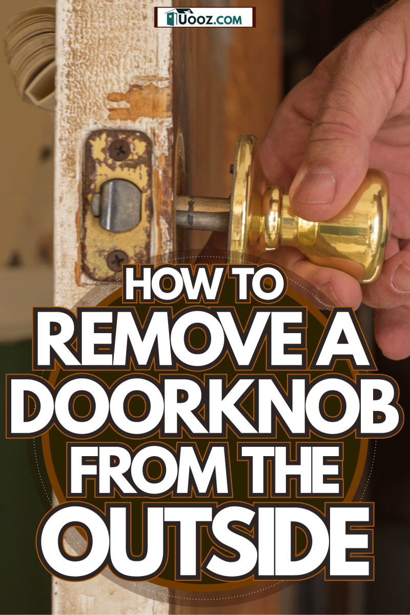 Door man installing a brass door, How To Remove A Doorknob From The Outside