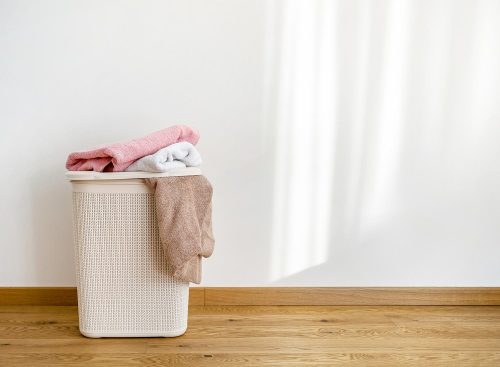 Laundry basket with dirty towels