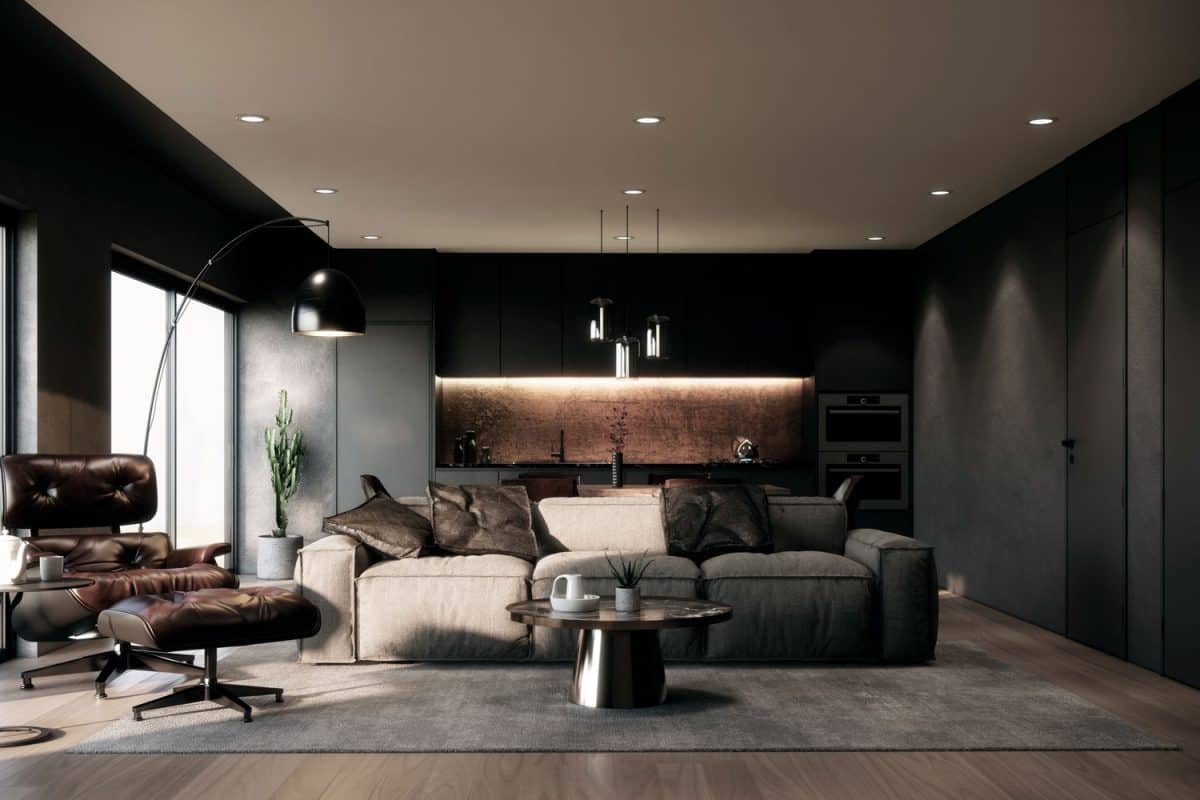 Ultra rustic living room with black leather sofas