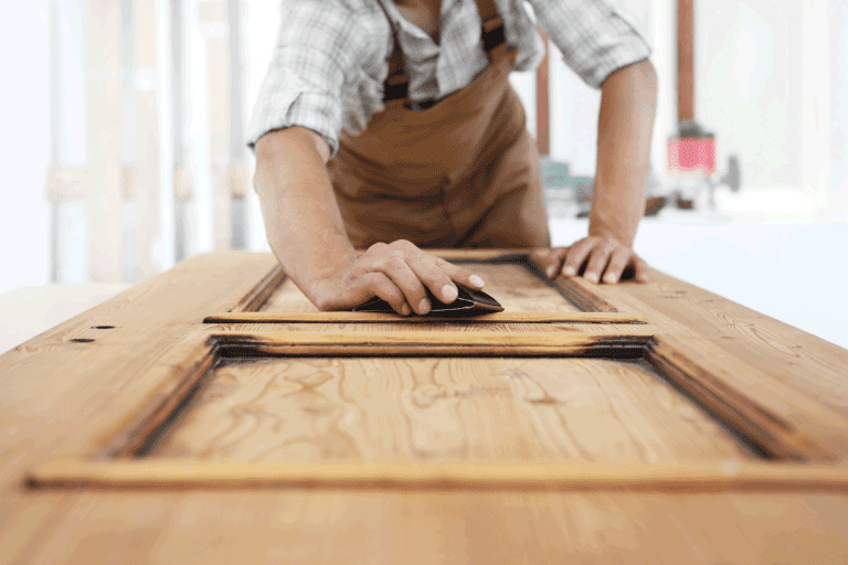 Carpenter-work-the-wood-with-the-sandpaper.-How-Big-Of-A-Gap-At-The-Bottom-Of-A-Door