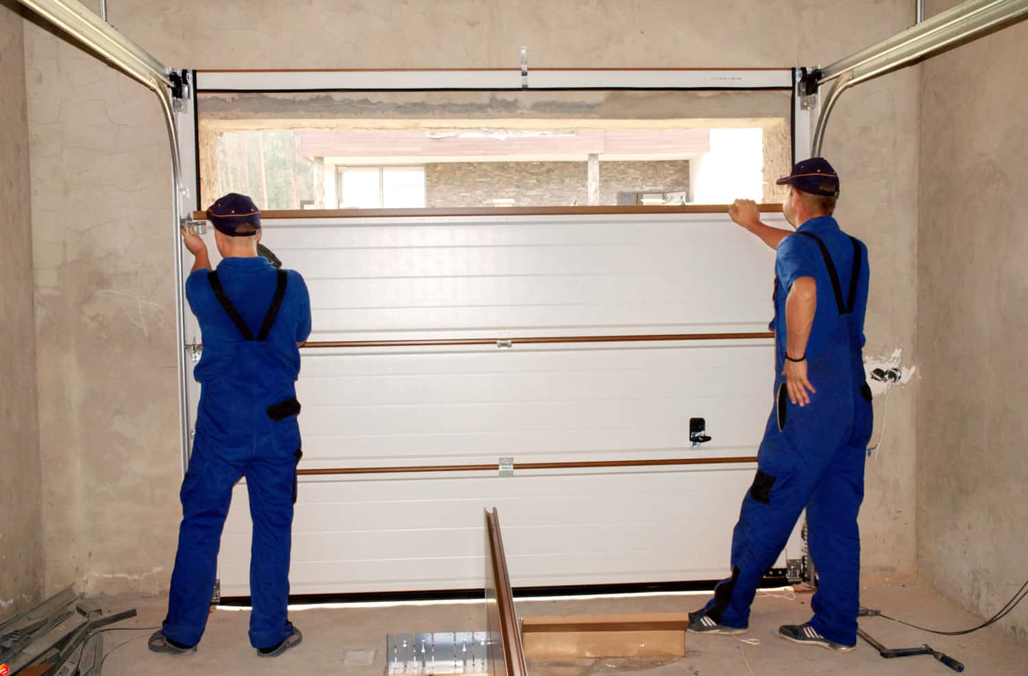 Contractors Installing, Repair, Insulating Garage Door. Garage door seal, garage door replacement, garage door repair.