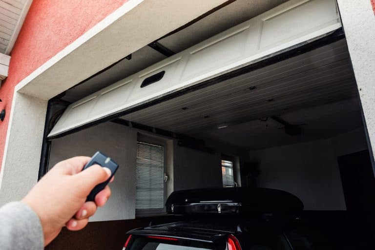 Hand use remote controller for closing and opening garage door, How To Enclose A Garage Door Opening?