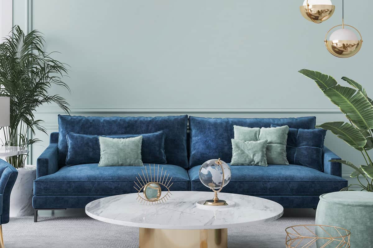 Home interior mockup with blue sofa
