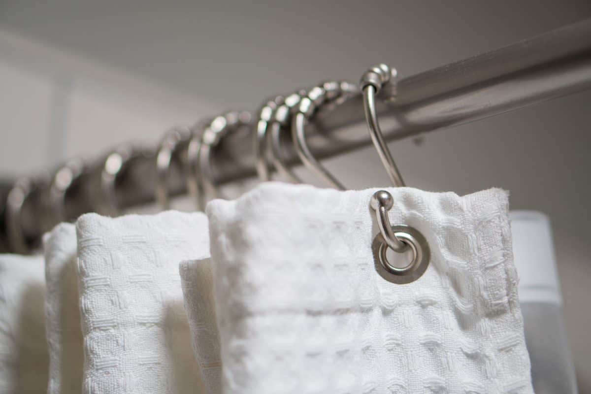 Stainless steel shower curtain rods and hooks