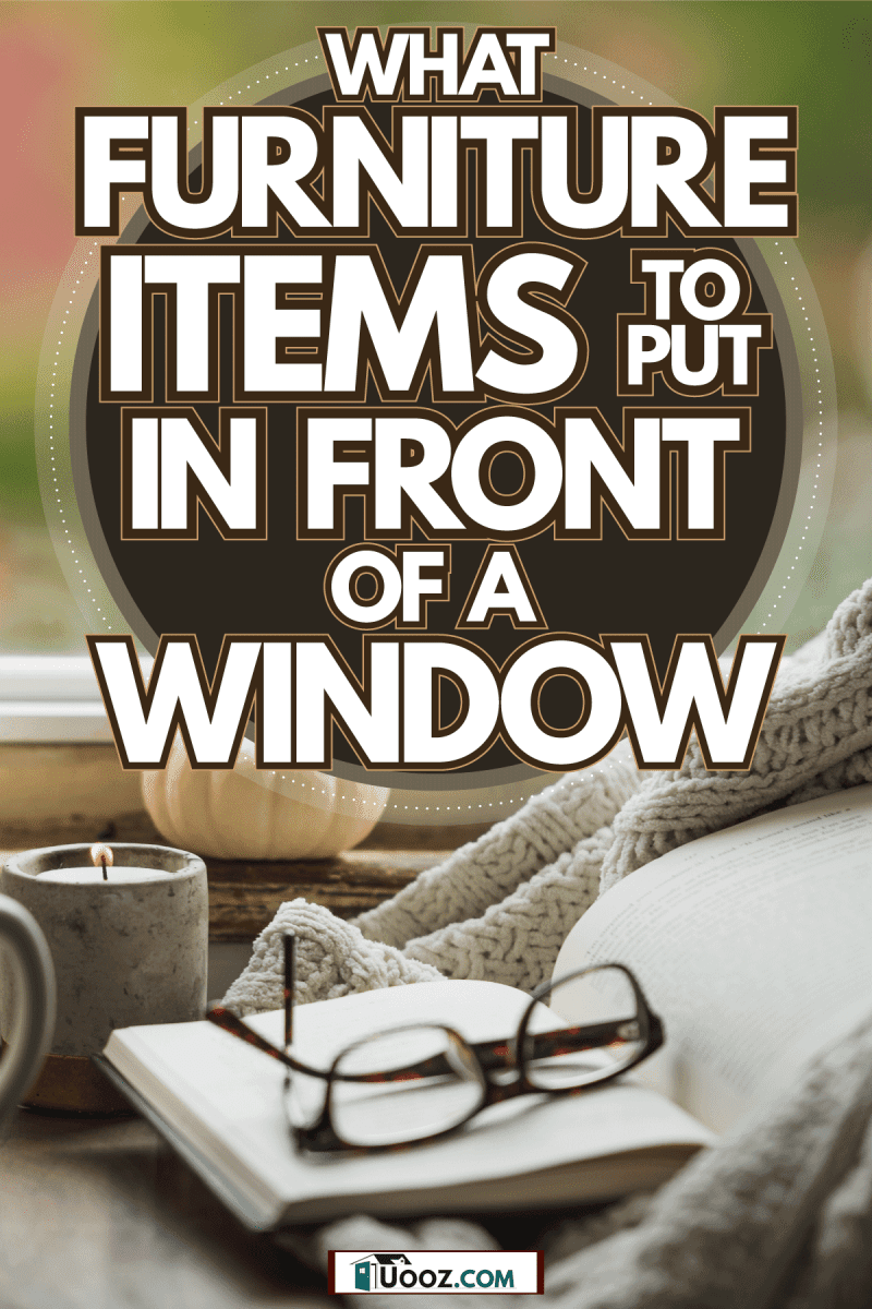 Small pumpkins, scented candles, and a plant on the window sill, What Furniture Items To Put In Front Of A Window