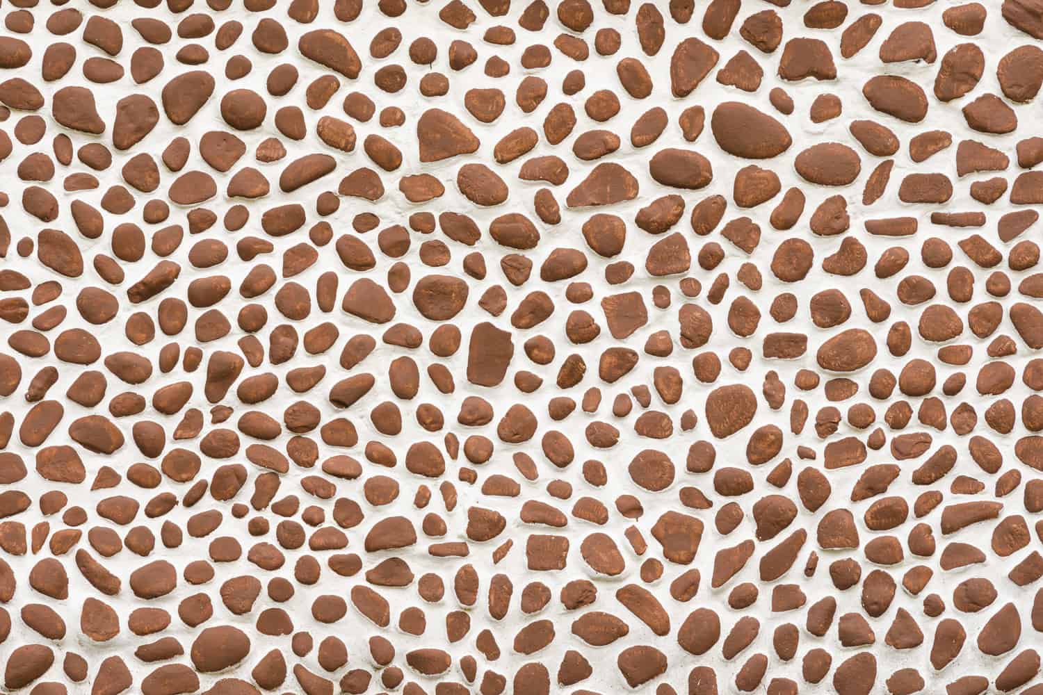 decorative wall pattern of a gravel stone on white background