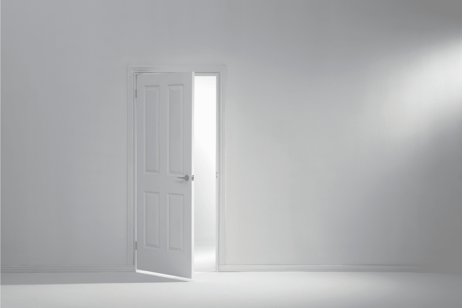 white room with inner door open