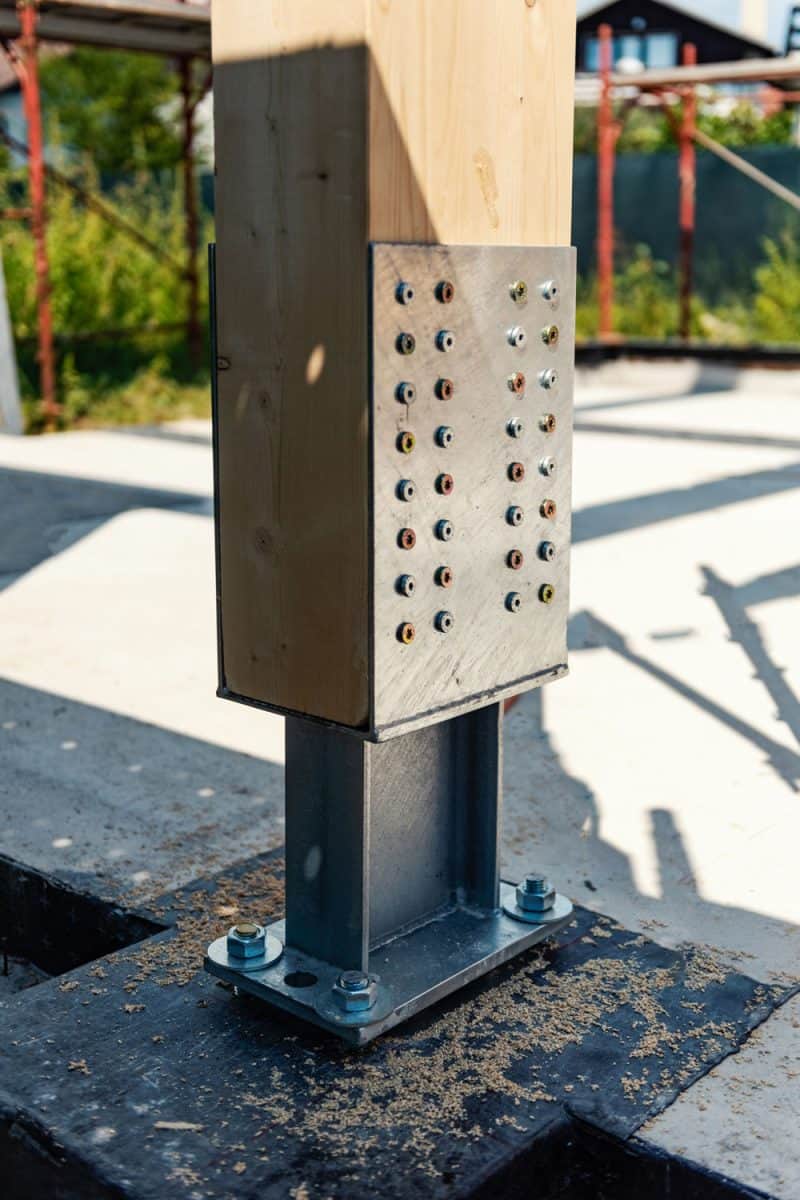 A steel beam foundation tightly sealed on metal screws
